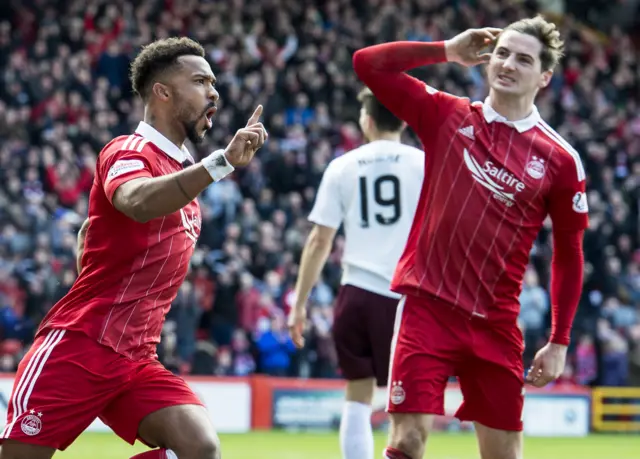 Aberdeen's Shay Logan and Kenny McLean celebrate