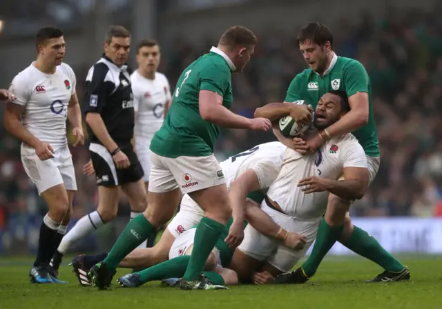 Billy Vunipola is tackled