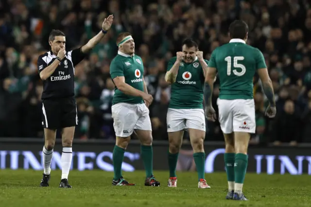 Ireland's players celebrate at full-time