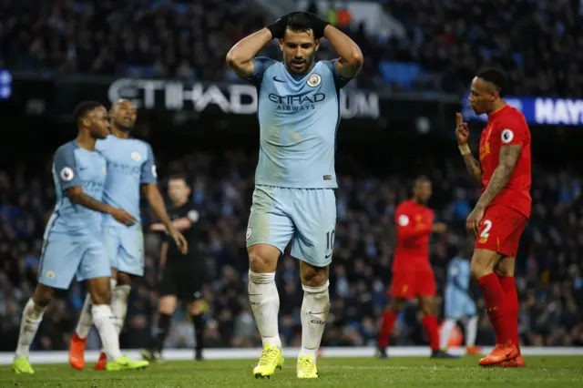 Aguero reacts