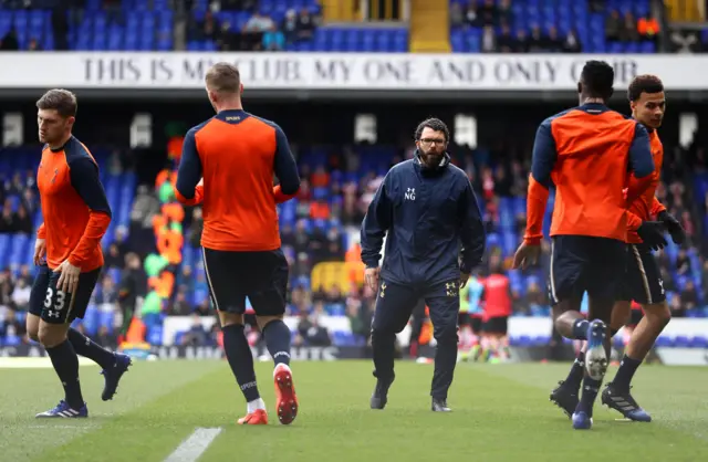 Spurs warm up