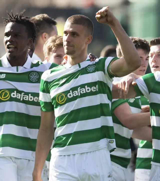 Jozo Simunovic (right) celebrates Celtic's first goal