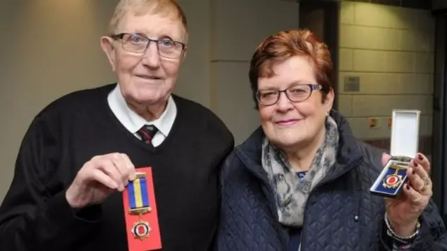 Ken and Maureen Gant with their medals