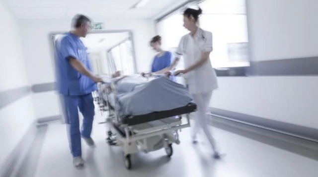 Nurses with patient