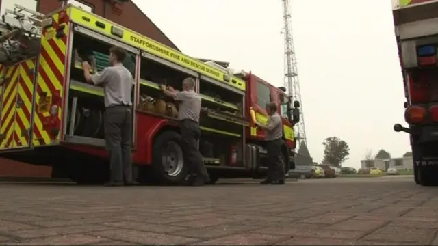 Staffordshire Fire and Rescue Service staff with engine