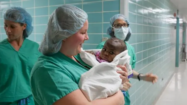 Dominique with medical staff