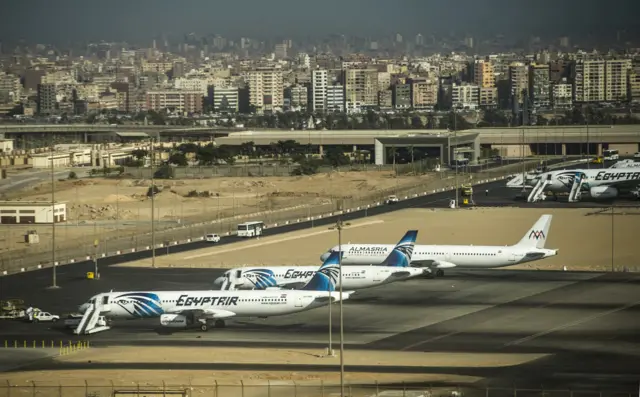 
          A picture taken on September 30, 2015 shows Egypt Air planes on the tarmac of Cairo international Airport.
        