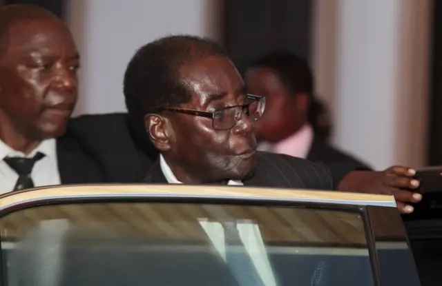 
          President of Zimbabwe Robert Mugabe (R) arrives for the Ghana Independence Day celebrations in Accra, Ghana, 06 March 2017.
        