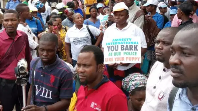 Protesters at Amnesty offices