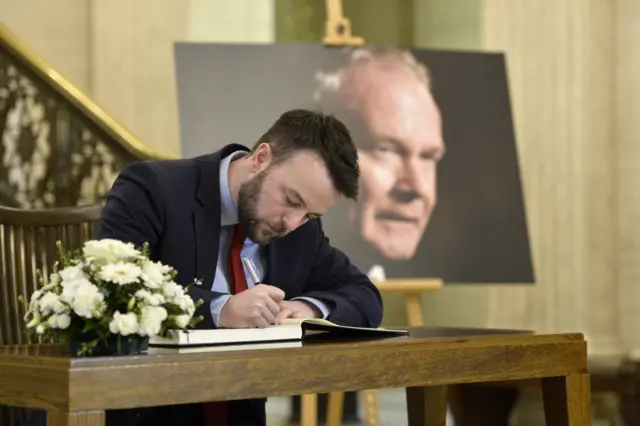 Colum Eastwood signs the book of condolence