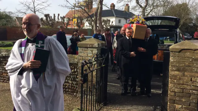 Scott Hawksworth's coffin on its way into church