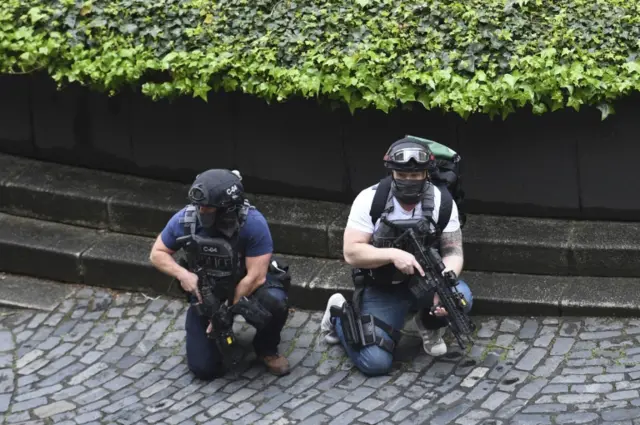 Armed police officers