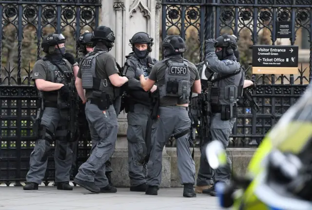 Armed police outside Houses of Parliament