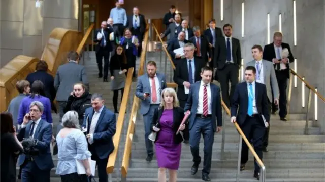 
          Politicians and staff immediately left the chamber once the debate had been suspended
        