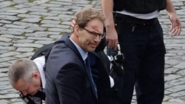 Tobias Ellwood at the scene of the attack in Parliament