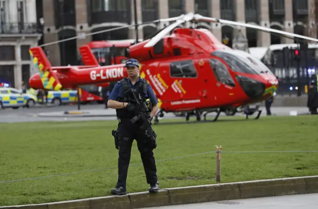 Armed police outside the Houses of Parliament