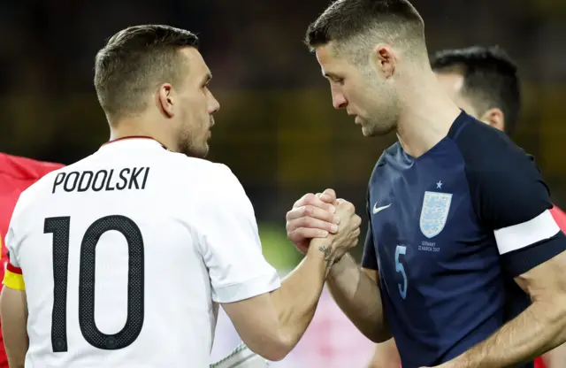 Lukas podolski and Gary Cahill