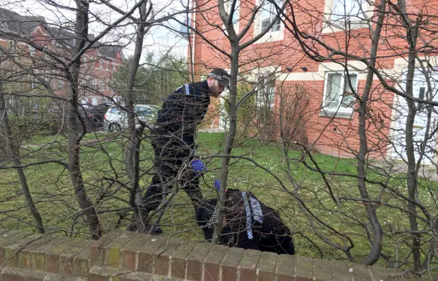 
          Police activity at an outside area of an address in Quayside, Winson Green, Birmingham
        