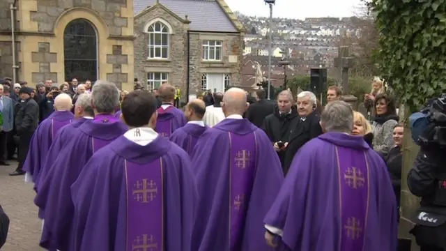 Priests proceeding to chuch