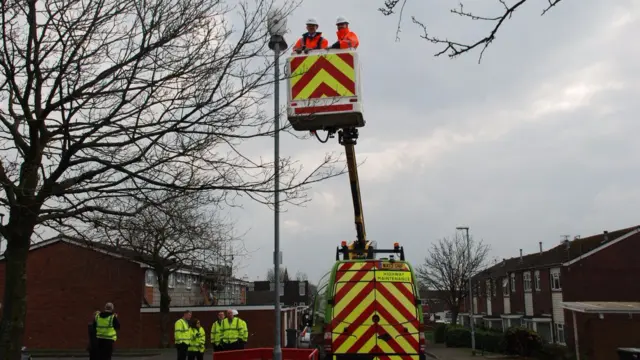 The first lights being installed today