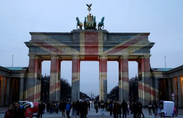 
          Brandenburg Gate, Berlin illuminated in the colours of the union jack
        