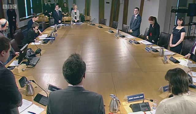 
          The committee and witnesses stand to observe the minute's silence.
        