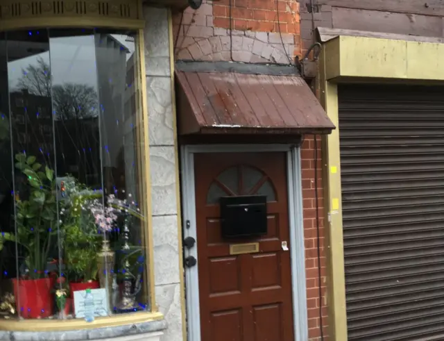 Door to flat which was raided on Hagley Road