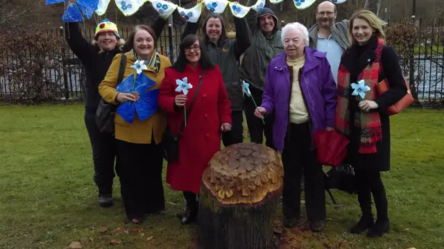 People around the sculpture at Hednesford Park