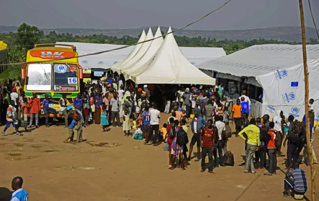 
          Newly arrived refugees from South Sudan queue in line waiting to be registered on November 11, 2016 at Kuluba Reception Centre in Koboko District,
        