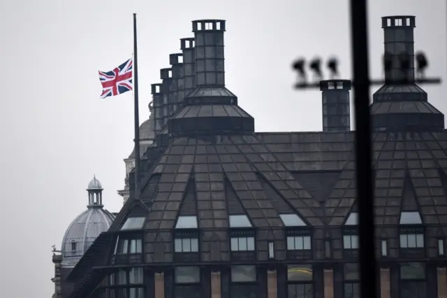 flag flies at half mast on Portcullis House