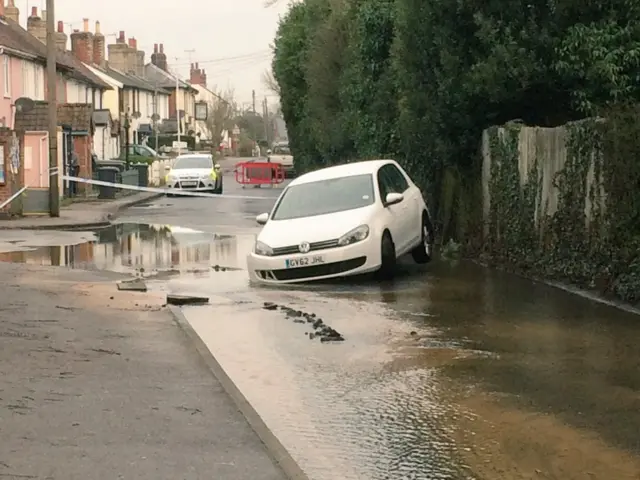 Car in collapsed water main, Holbrook