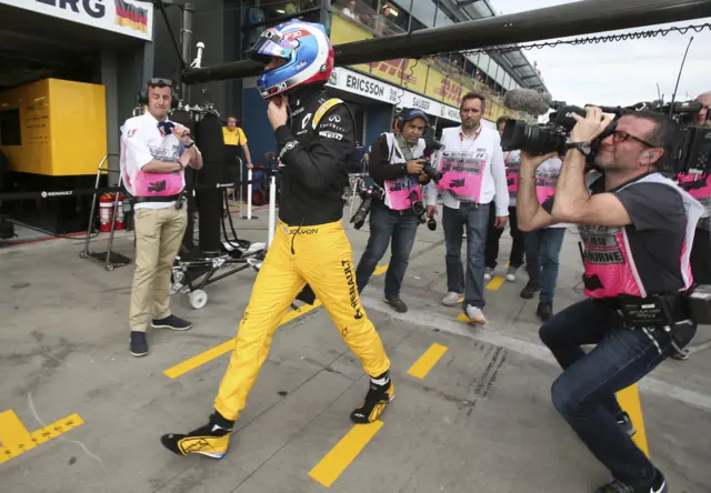 Palmer walks back to the garage