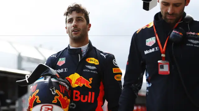 Ricciardo walks back to the garage