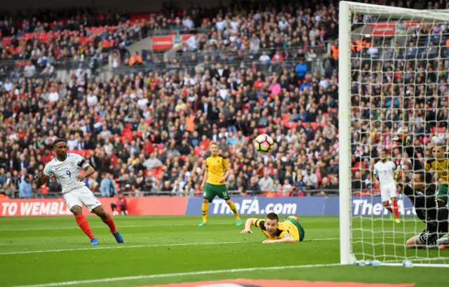 England's Jermaine Defoe scores