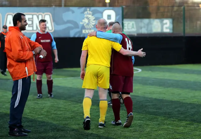 FA People's Cup players hug