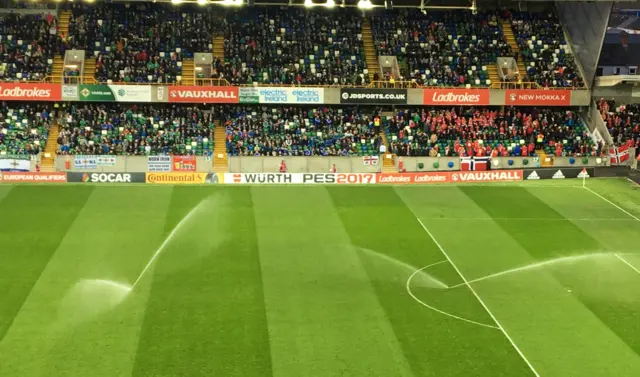 Watering the Windsor Park pitch pre-match