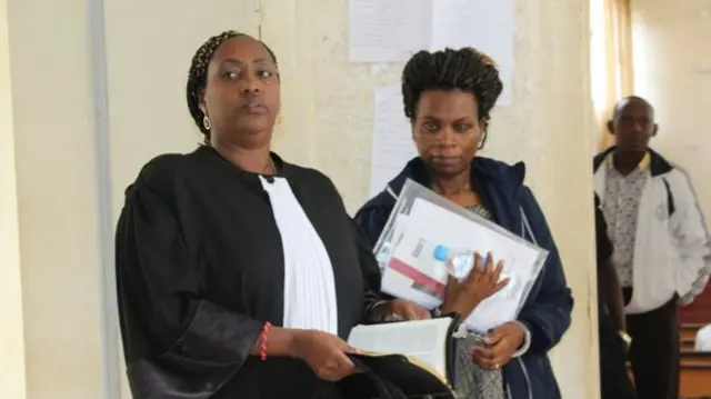 Ms Uwamahoro outside the court room