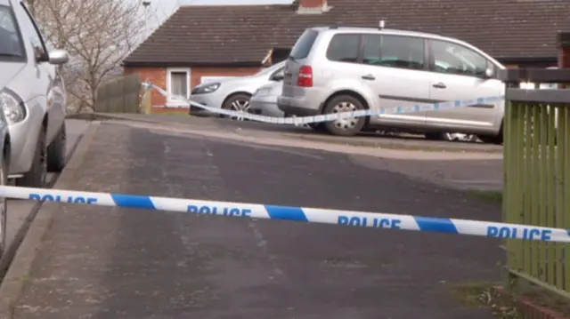 Police cordon in car park