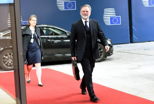 Sir Tim Barrow arriving at the European Council building