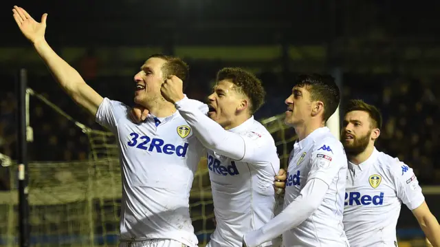 Chris Wood and Leeds teammates celebrate his goal