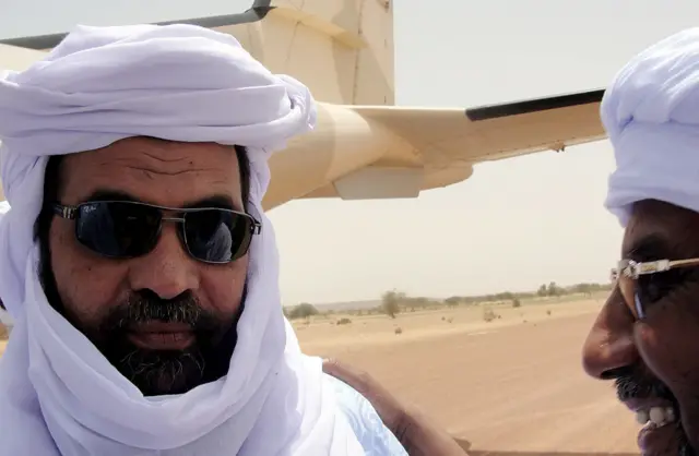 Iyad Ag Ghali leader of the Islamic group of Ansar Dine (L)
