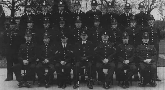 A photo of former police officers