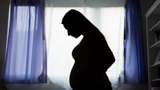 Silhouette of a pregnant woman