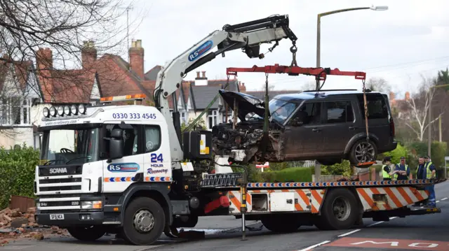 Land Rover removed by police