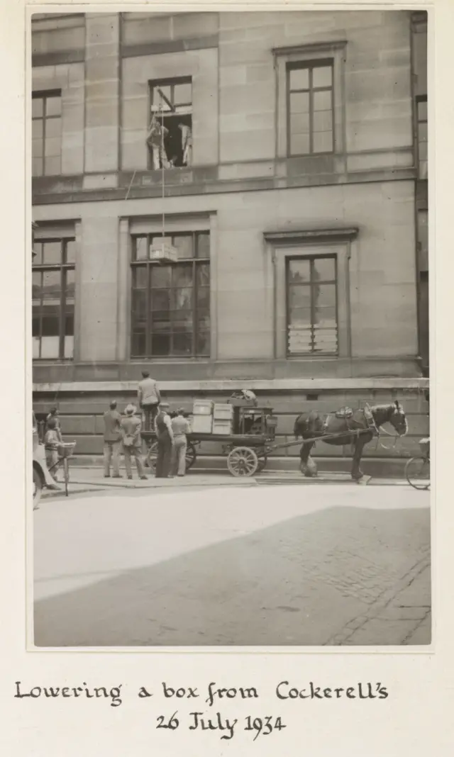 Lowering of books from a window