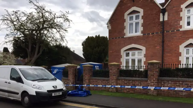 
          Police outside family home in Norton in which two people were fatally stabbed
        