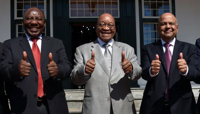 
          President Zuma (C) has been criticised by Deputy President Cyril Ramaphosa (L) for sacking Pravin Gordhan (R)
        