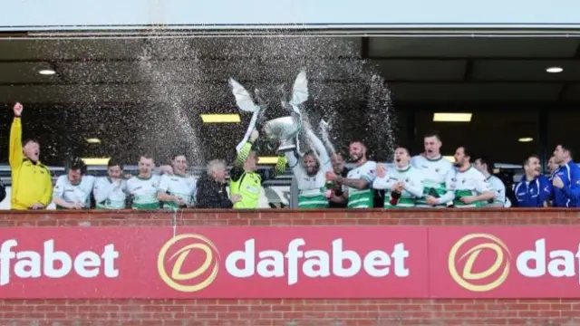 TNS lifting WPL trophy