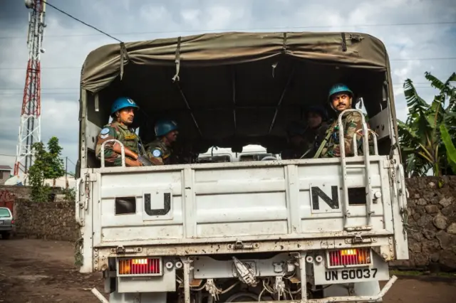 
          Blue Helmet peacekeepers in DR Congo look on from a United Nations truck in Goma on November 8, 2016
        