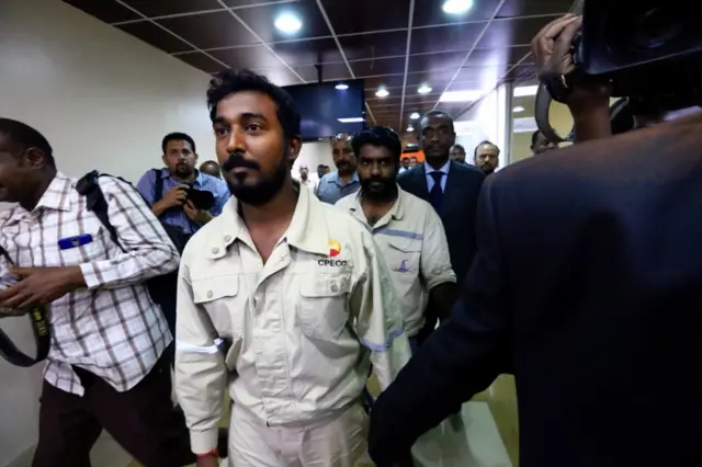 
          Three foreign oil workers kidnapped by rebels in South Sudan arrive after being released at Khartoum Airport, Sudan, March 30, 2017
        